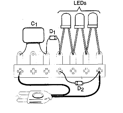 Figure 4 - Assembly of the circuit based on a small terminal bridge. Notice that the cathodes (flat side) are for the right.
